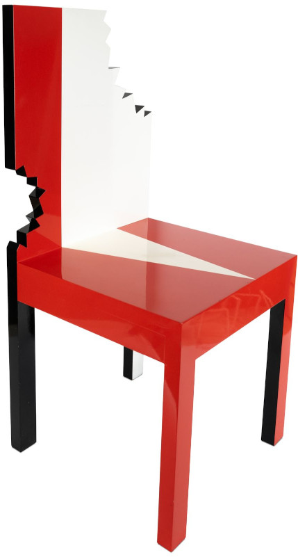 Red and white chair with parts of it bitten away