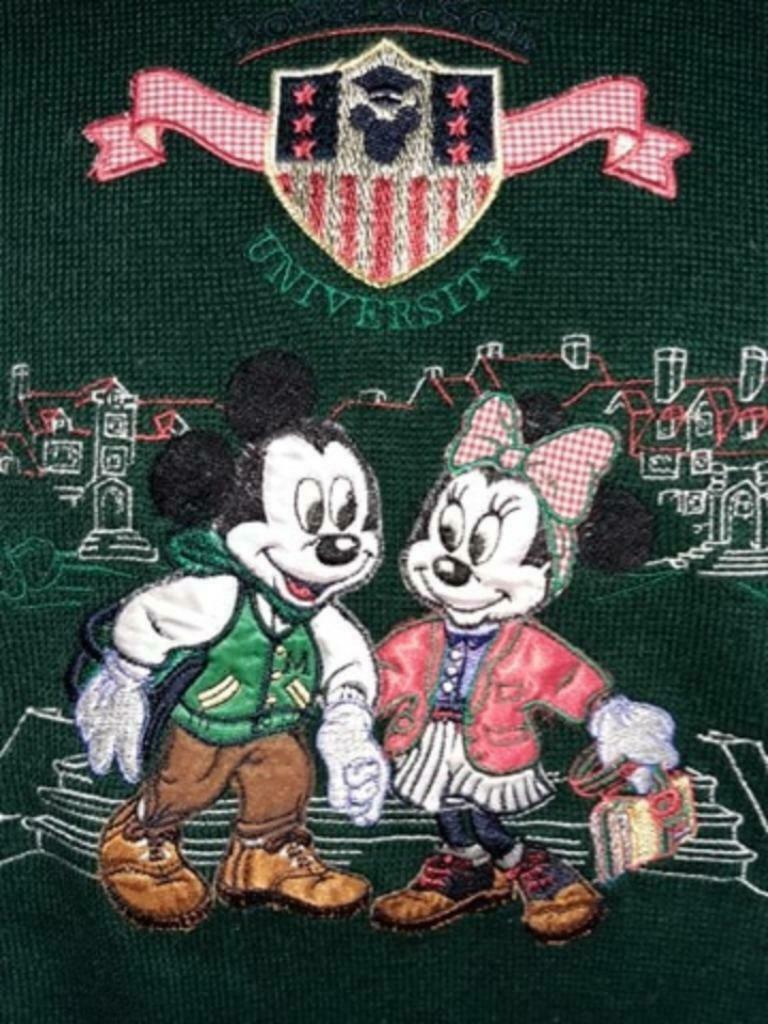 Mickey and Minnie wearing university appropriate clothing.