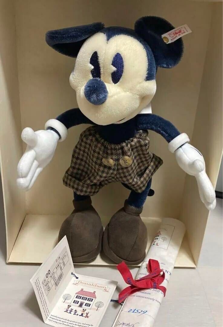 A vintage-looking Mickey Mouse wearing tweed shorts.