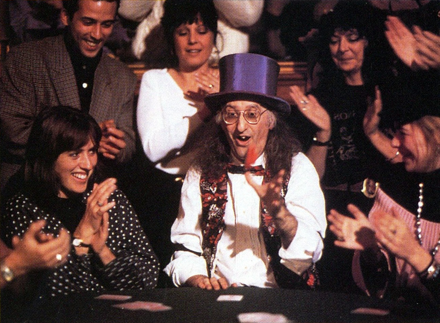 Tamariz at a table playing cards