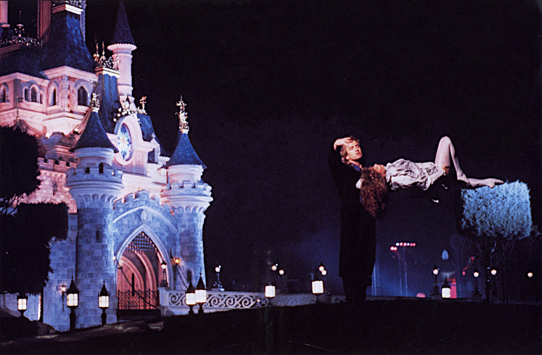 Spleeping Beauty's Castle at night, with a floating trick performed in front of it