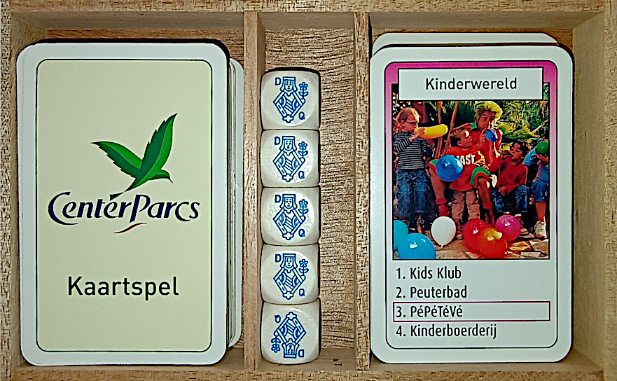Inside, there's a deck of playing cards, some poker dice, and a themed Quartets game.