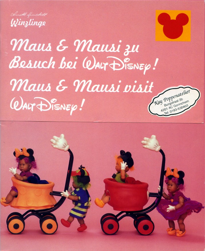 Several baby dolls push forward other dolls in a Mickey-themed stroller.