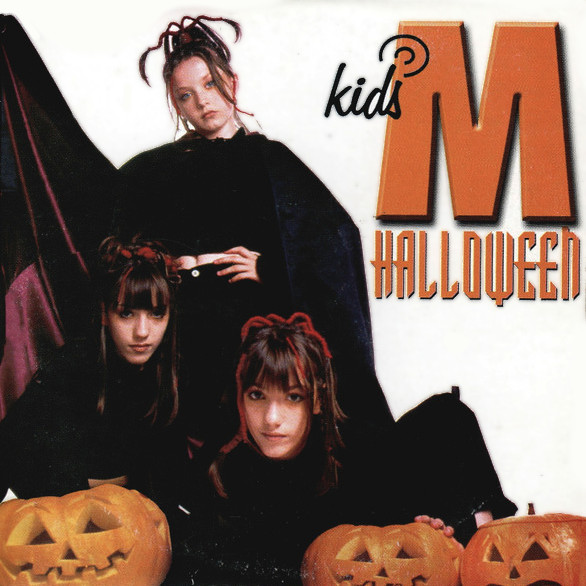 An album cover showing three young girls in dark costumes, surrounded by plastic pumpkins