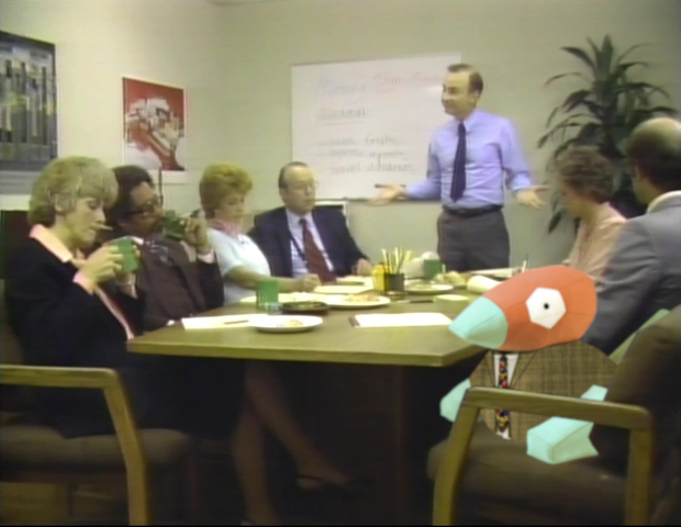 Porygon in a business suit, sitting in some meeting